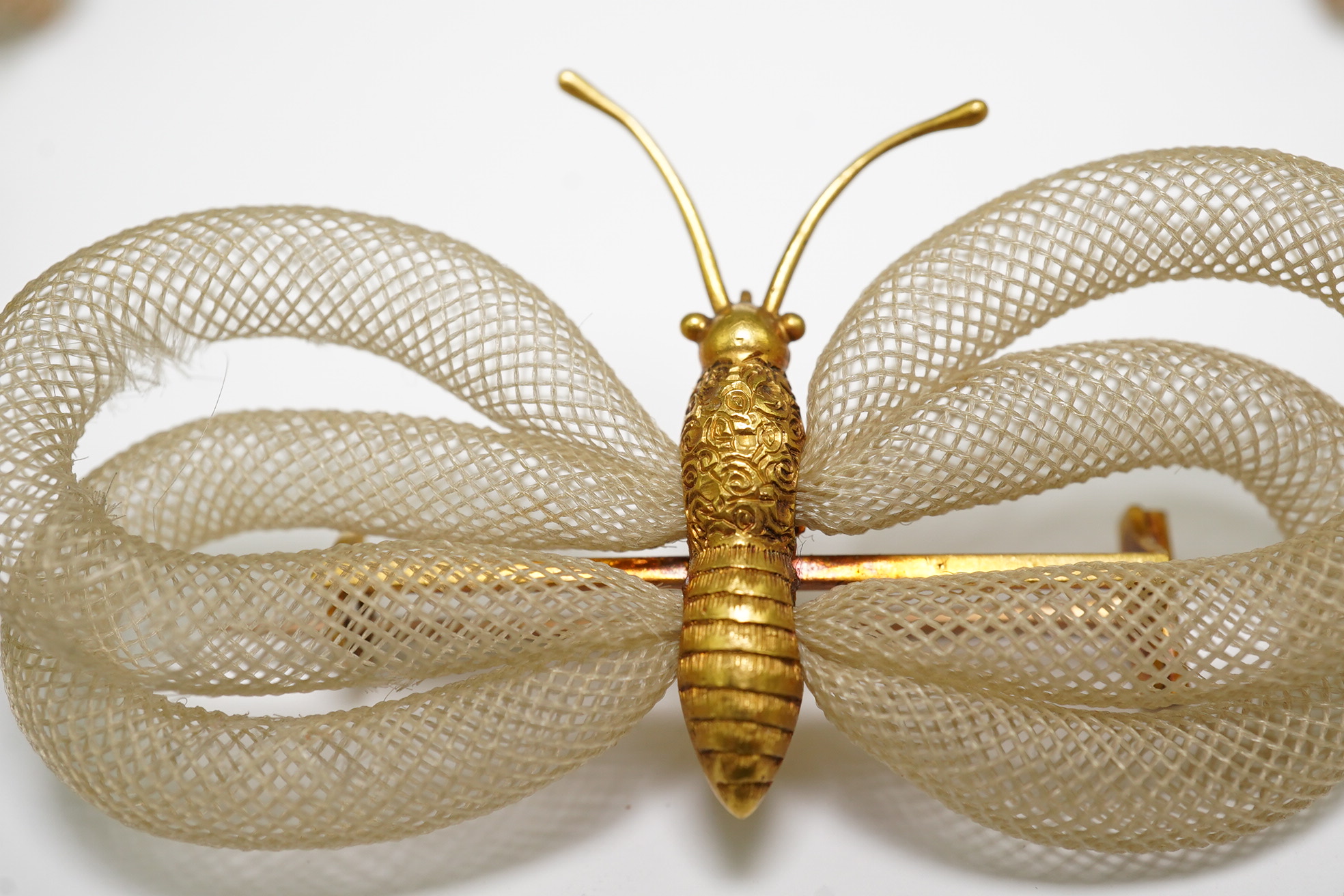 Antoni Forrer (1802/3-1889), 'Artiste en Cheveux', 136 Regent Street, London. A pair of gold mounted hairwork drop earrings and a butterfly brooch